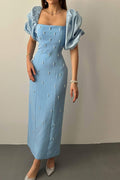 Robe bleue perlée