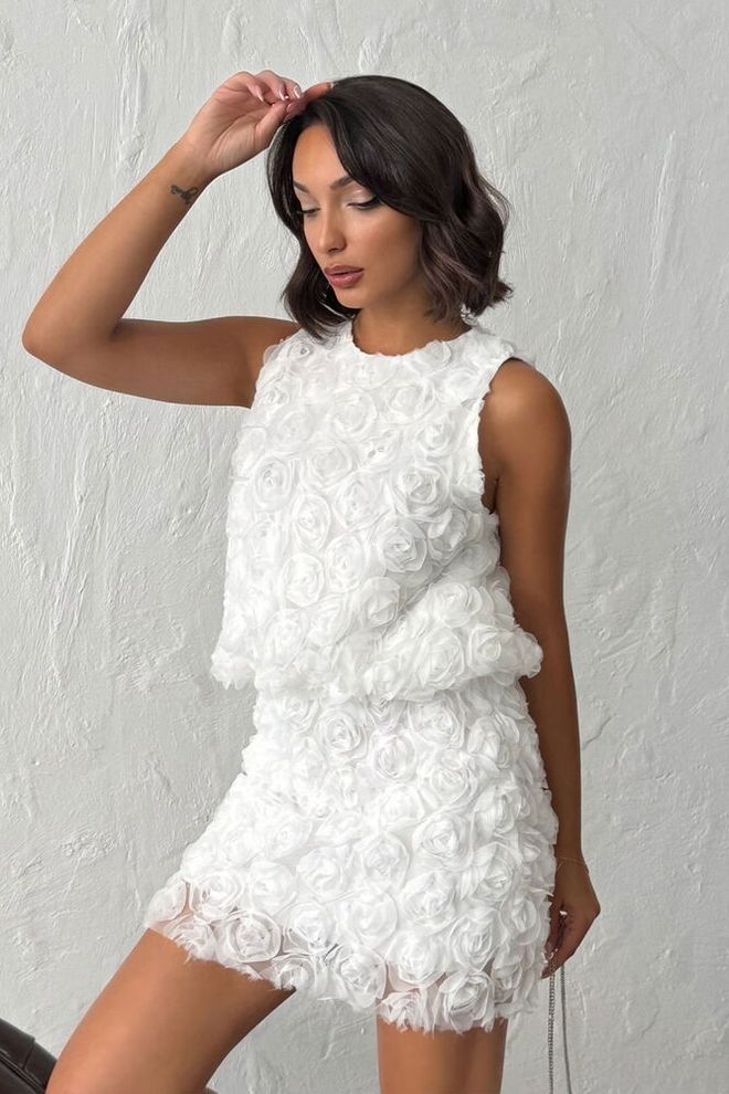 Ensemble top et jupe rose brodée