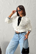 Veste à broderie rose